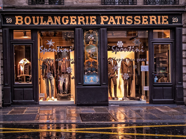 A clothing store with a beautiful storefront display.